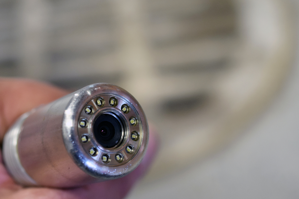 Sewer camera head close up.