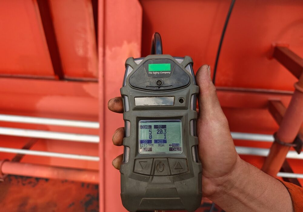 A professional technician from Leak Detection Service Pros using an electronic sewer gas detection device